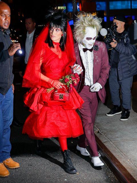 bella-hadid-and-the-weeknd-dress-as-beetlejuice-and-lydia-news-photo-1055842230-1541073709.jpg